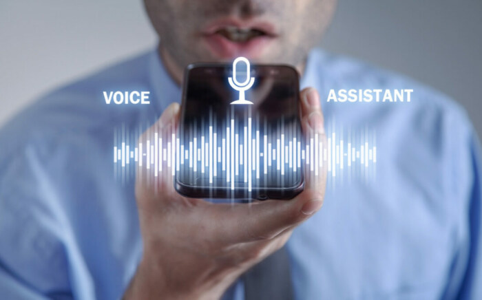 A user interacting with a voice assistant, symbolizing the evolution and importance of voice search optimization.