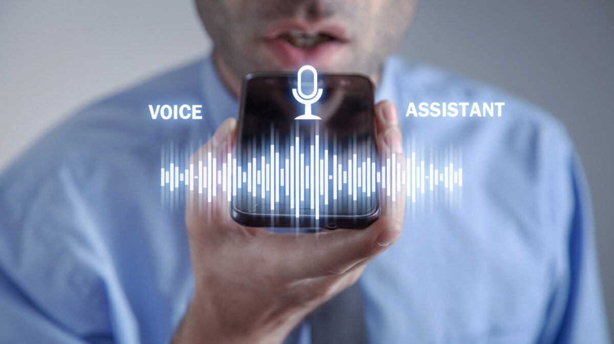 A user interacting with a voice assistant, symbolizing the evolution and importance of voice search optimization.